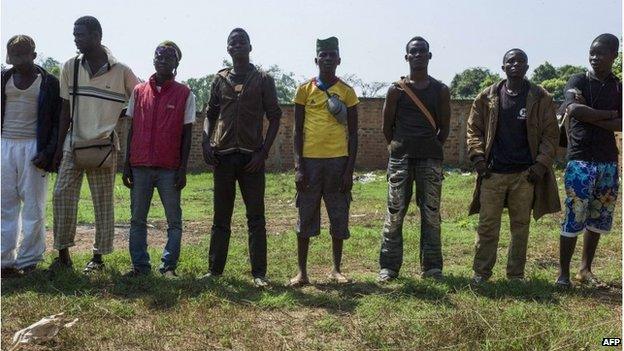 Christian vigilantes known as "anti-balaka" wait for the start of a meeting in the Boy-Rabe neighbourhood of Bangui, Central African Republic, on 15 February.