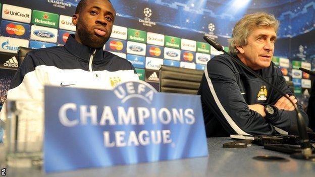 Manchester City manager Manuel Pellegrini (right) and midfielder Yaya Toure