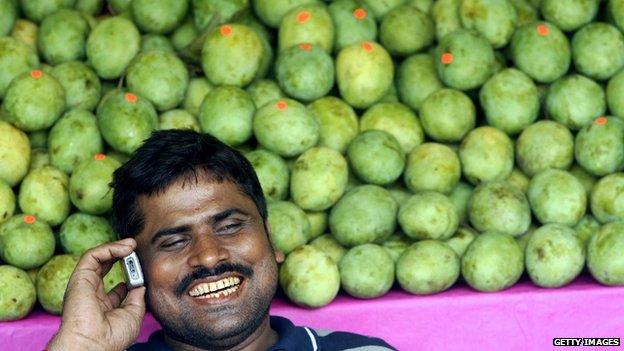 Mango seller on the phone