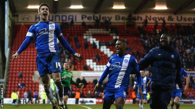 Peterborough United celebrate going to Wembley