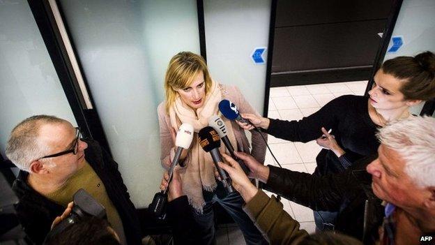 Dutch journalist Rena Netjes arrives at Schiphol Airport in the Netherlands on 4 February 2014, after being accused by Egypt of being part of a "terror cell" involving broadcaster al-Jazeera