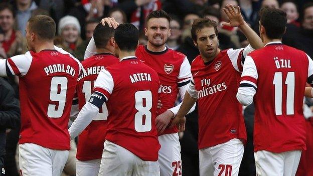 Arsenal celebrate their first goal in the FA Cup win against Liverpool