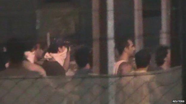 Detainees riot at the Manus Island Detention Centre on 16 February 2014 in this still image taken from ABC footage