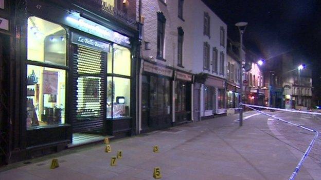 Police tape outside hair salon