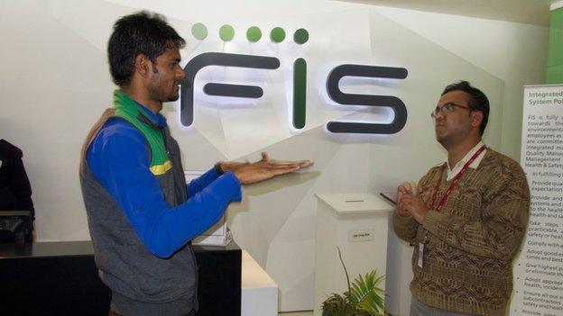 Alok Sagar (left) and Vipin Kumar, both deaf, are the first hearing impaired workers at FIS Global Business Solutions in Gurgaon, a key Indian finance and industrial centre near Delhi