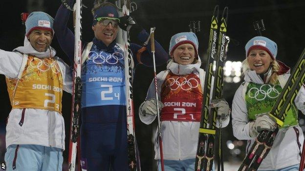 Norway's relay team Ole Einar Bjoerndalen, Emil Hegle Svendsen, Tora Berger and Tiril Eckhoff celebrate