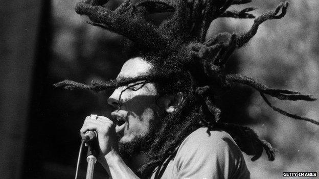 Bob Marley performing on stage