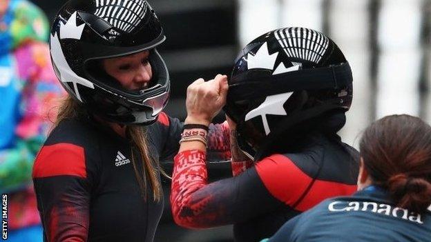 Kaillie Humphries and Heather Moyse (left) of Canada team 1