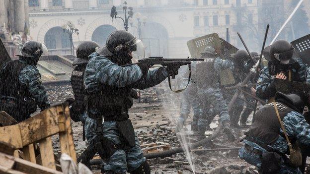 Berkut riot police shoot rubber bullets toward anti-government protesters on Independence Square on February 19, 2014 in Kiev, Ukraine.