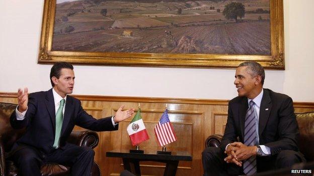 US President Barack Obama (R) attends a bilateral meeting with Mexico's President Enrique Pena Nieto at the El Palacio de Gobierno del Estado de Mexico before the start of the North American Leaders Summit in Toluca, Mexico 19 February 2014