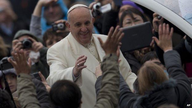 Pope Francis waving