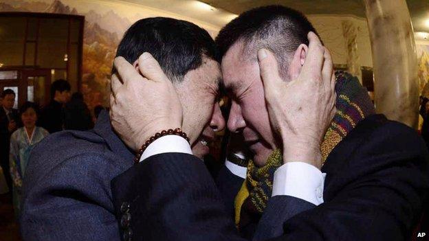 South Korean Park Yang-gon, left, and his North Korean brother Park Yang Soo get emotional as they met during the Separated Family Reunion Meeting in North Korea, 20 February 2014