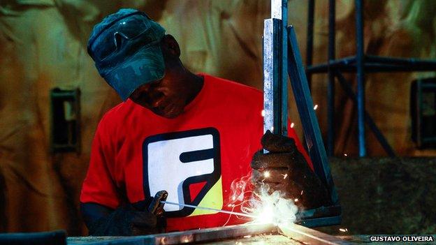 Man working on carnival float