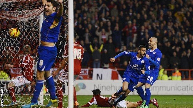 Leicester's Riyad Mahrez turns to run and celebrate scoring to make it 2-2 in the game against Nottingham Forest