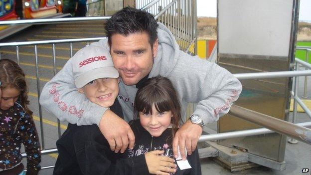 San Francisco Giants baseball fan Bryan Stow and his two children in April 2011 before the attack