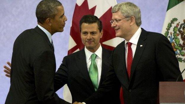 US President Barack Obama, Mexican President Enrique Pena Nieto and Canadian Prime Minister Stephen Harper at a summit in Mexico on 21 February, 2014