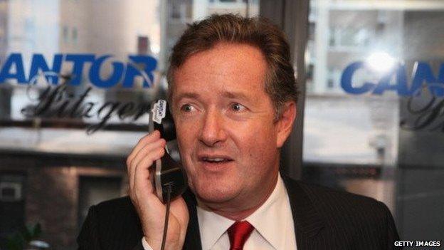 Piers Morgan talks on the phone in New York on 11 September, 2013.