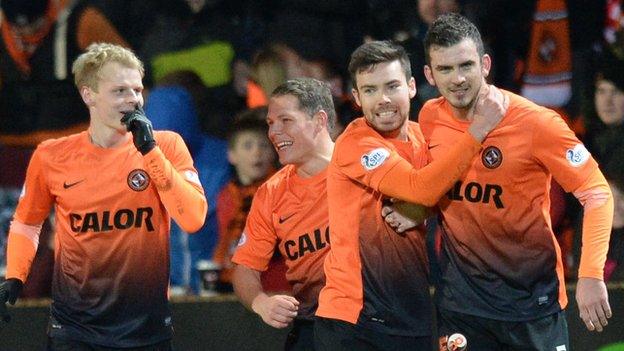 Gavin Gunning celebrates his return from injury with the first of his goals.