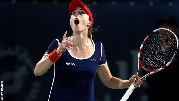 Alize Cornet celebrates her win over Serena Williams