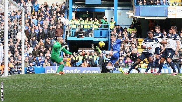 John Terry tries to get on the end of a Frank Lampard free-kick from which Chelsea scored the winner against Everton