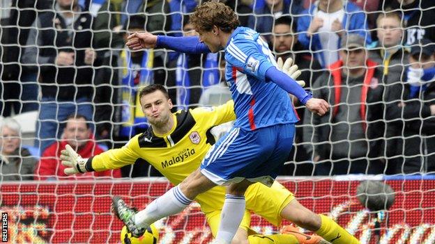 Hull's Nikica Jelavic scores past Cardiff goalkeeper David Marshall