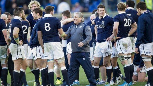 Scotland celebrate at the final whistle after beating Italy 21-20