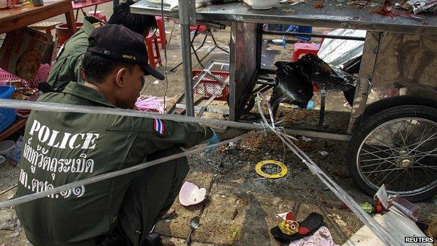 Police scour area of gun and bomb attack in Khao Saming