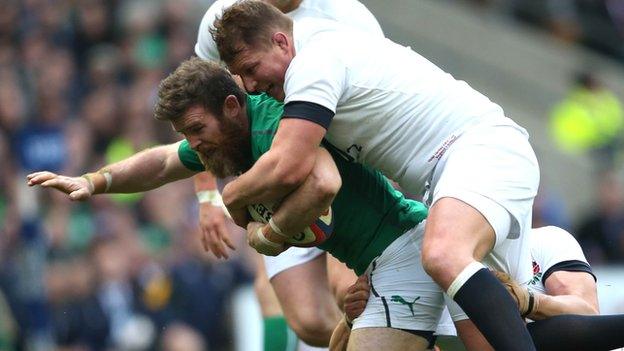 Gordon D'Arcy is tackled by Dylan Hartley in Saturday's clash at Twickenham