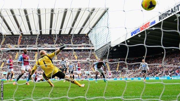 Newcastle striker Loic Remy shoots past keeper Brad Guzan for his side's winner against Aston Villa