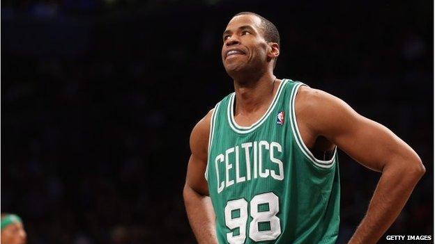 Jason Collins in a Boston Celtics shirt, playing against the Brooklyn Nets on 15 November 2012