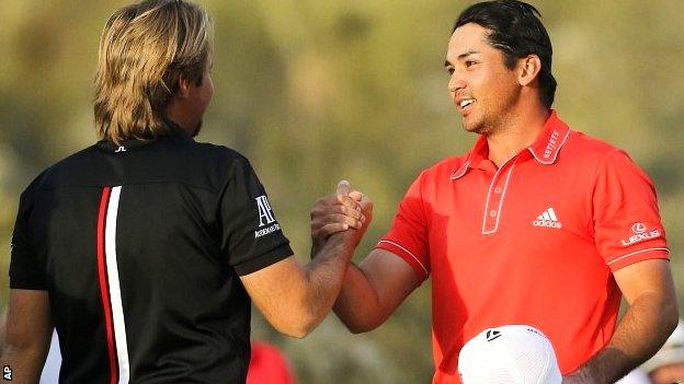 Jason Day (right) is congratulated by Victor Dubuisson after winning the WGC Match Play title in Arizona