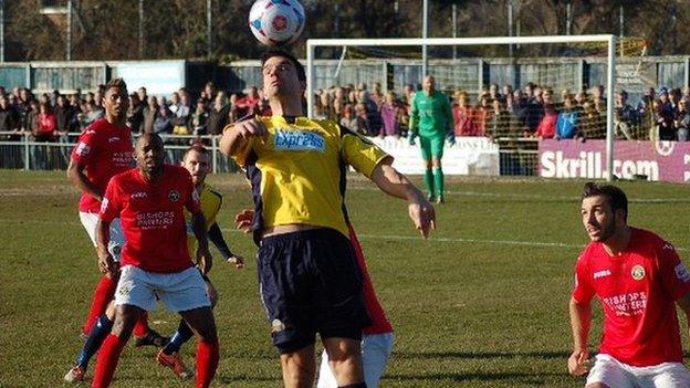 Tim Sills of Gosport Borough heads clear against Havant and Waterlooville