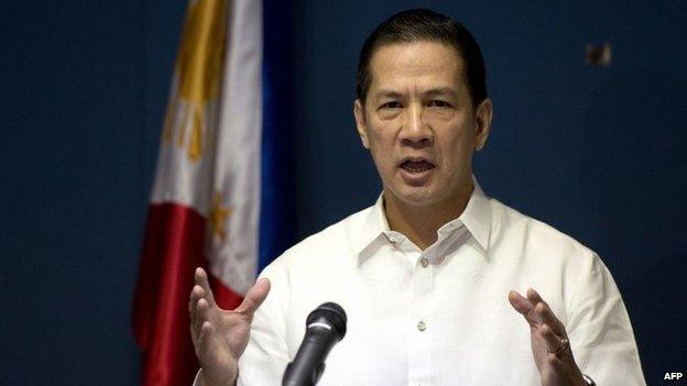 Department of Foreign Affairs (DFA) spokesman Raul Hernandez answers questions during a press conference at the DFA building in Manila on 25 February 2014