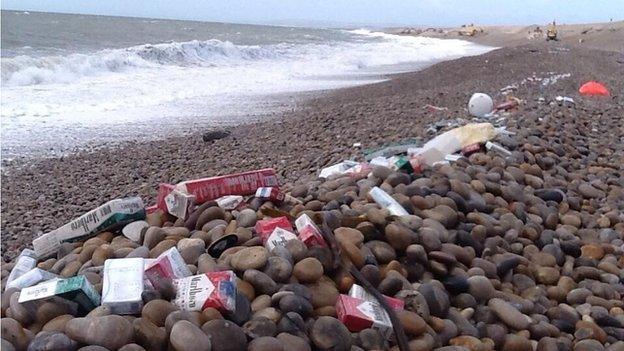 Washed-up cigarettes on Chesil Beach