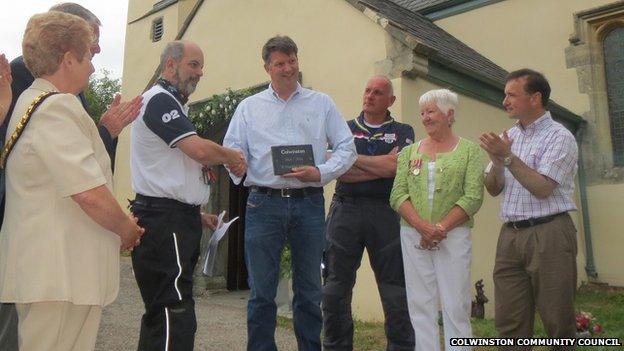 The people of Colwinston receive their 'thankful' village plaque