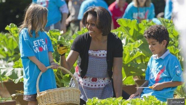 3 June 2011 file photo of First Lady Michelle Obama tending the White House garden