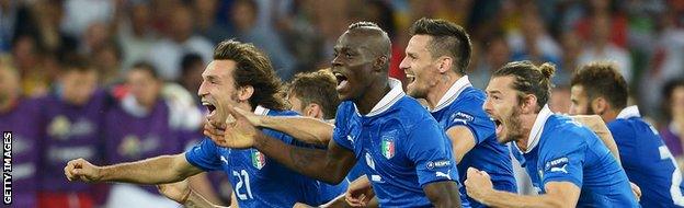 KIEV, UKRAINE - JUNE 24: Mario Balotelli and Andrea Pirlo of Italy (C) celebrates with team-mates after victory during the UEFA EURO 2012 quarter final match between England and Italy.