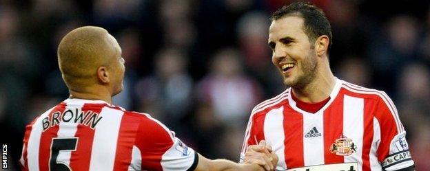 Wes Brown and John O'Shea celebrate after Sunderland's win over Manchester City in November