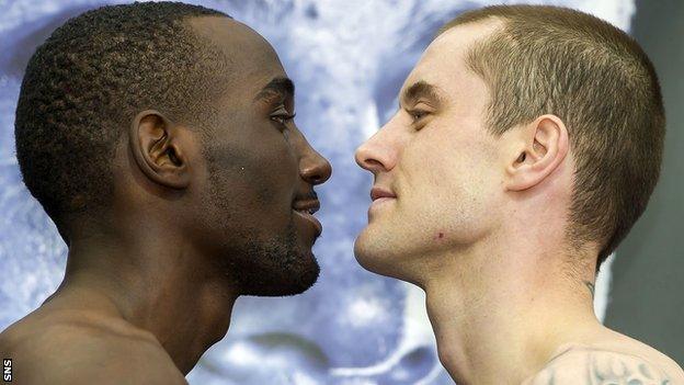 Ricky Burns (right) squares up to Terence Crawford at the weigh-in.