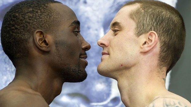 Ricky Burns (right) squares up to Terence Crawford at the weigh-in.