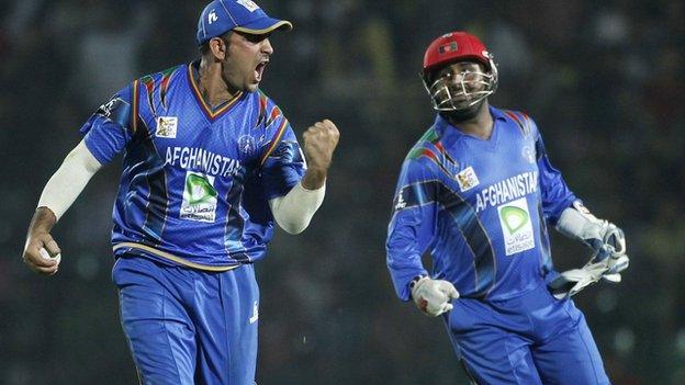 Samiullah Shenwari and Mohammad Shahzad celebrate Afghanistan's win