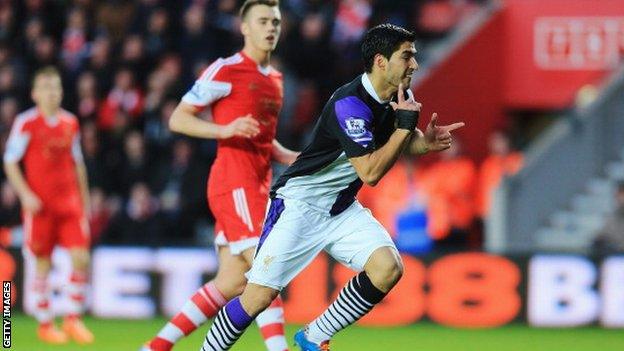 Liverpool striker Luis Suarez celebrates scoring against Southampton