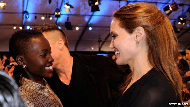 Lupita Nyong'o and Angelina Jolie at the Independent Spirit Awards, Santa Monica, 1 March 2014