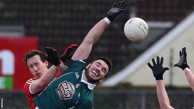 Colm Cavanagh battles with Fergal Conway at Newbridge