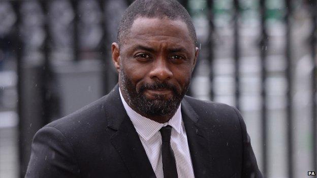 Actor Idris Elba arrives for the service