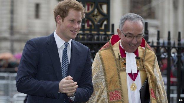 Prince Harry walks with Dean of Westminster Abbey John Hall