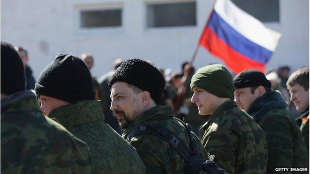 Militiamen outside a Ukrainian base in Perevalne, Crimea, March 3