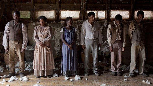 Lupita Nyong'o and Chiwetel Ejiofor (centre) in 12 Years a Slave