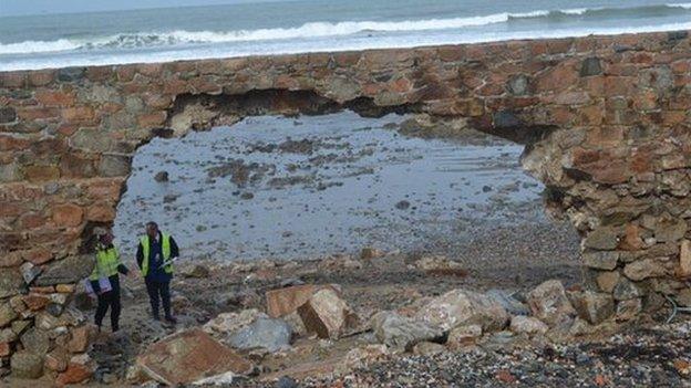 The Vazon sea wall being examined by States Works engineers