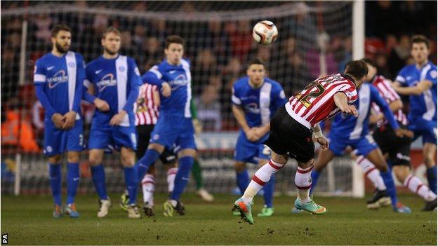 Ben Davies scores the winner